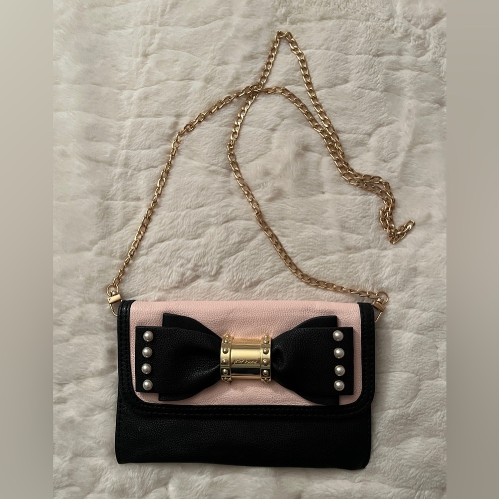 Betsey Johnson Elegant Black and Pink Clutch with Bow Accent